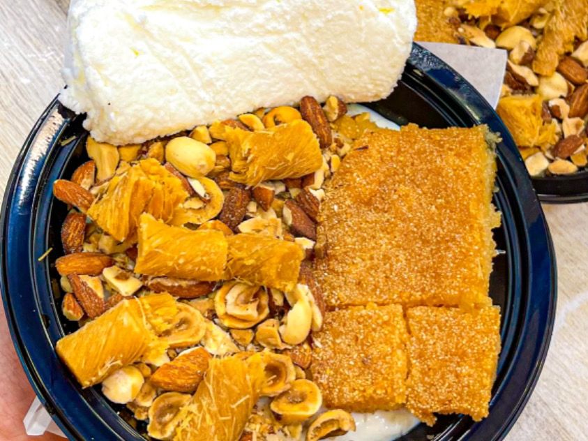 Rice Pudding With Konafa And Basbousa And Qeshta And Nuts