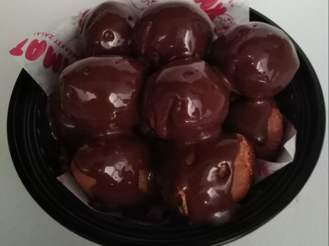 Nutella Lokmatos with nutella sauce and nuts