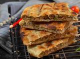 2 Hawawshi Loaves On Charcoal