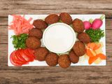 Dozen Falafel 12 Pieces With Vegetables And Tarator and Pickles