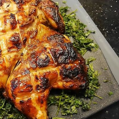 1/2 chicken with rice and vegetables meal