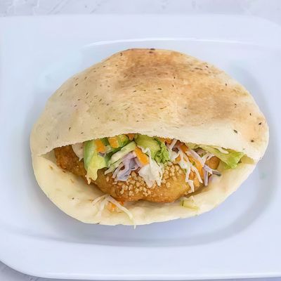 Falafel sandwich stuffed with green salad