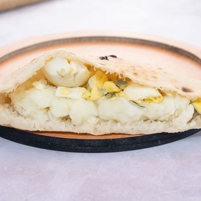 Mashed potato sandwich with boiled eggs
