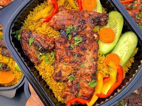 A Quarter Chicken Breast Meal On Charcoal