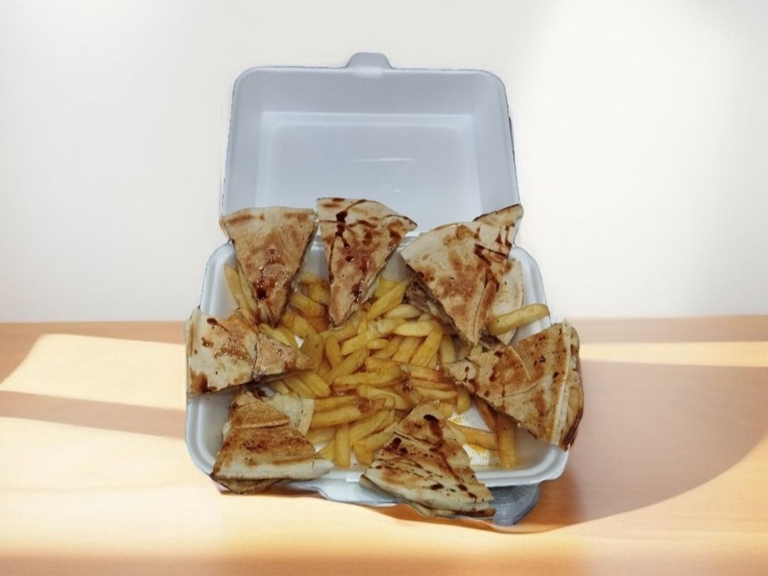 Chicken Hawawshi meal with cheese