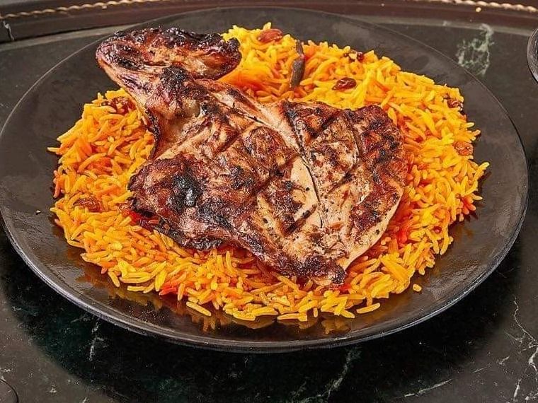 Quarter chicken breast with rice
