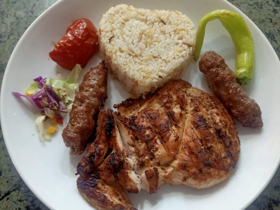 A Quarter Of A Chicken With 2 Fingers Of Kofta