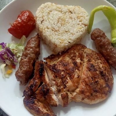 A Quarter Of A Chicken With 2 Fingers Of Kofta