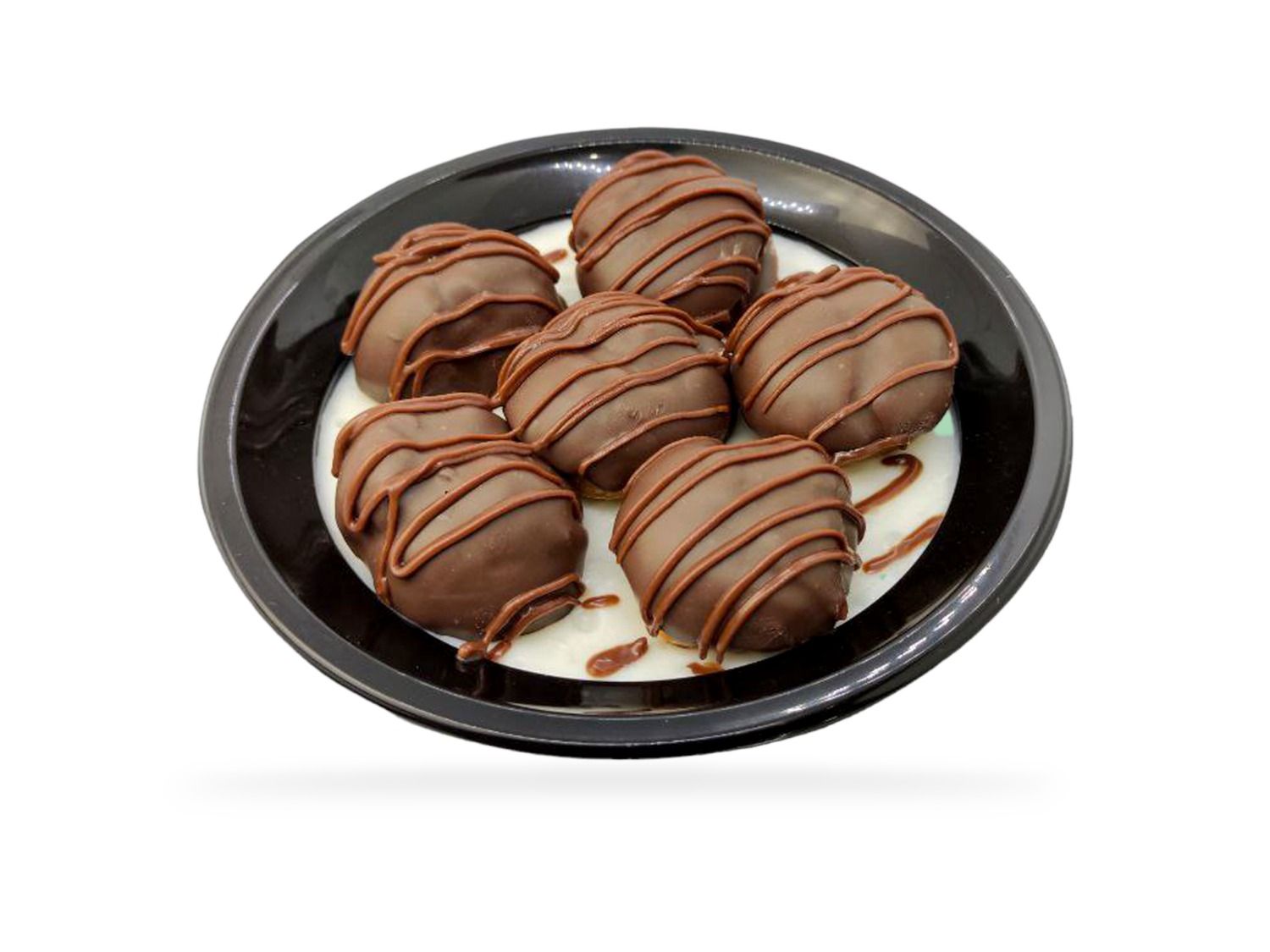 A Box Of Rice Pudding And Choo Chocolate With Hazelnuts