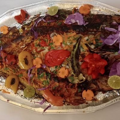 Sea bass meal served with boneless seafood soup