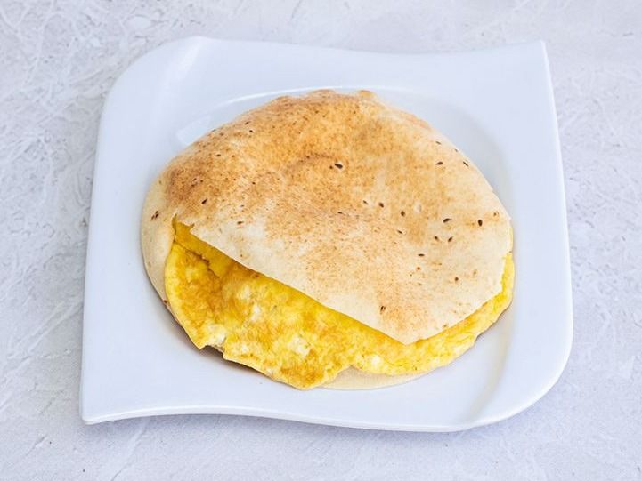 Potatoes With Fried Eggs Sandwich