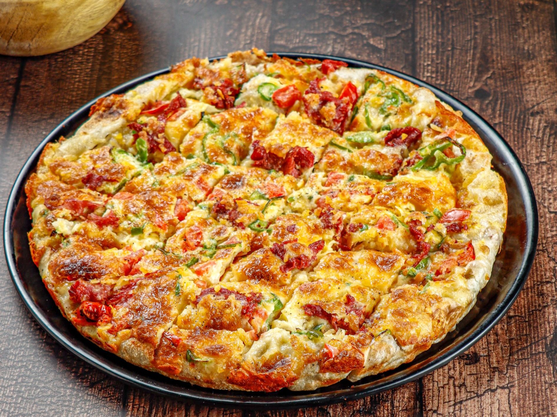 baladi sausage oriental pizza