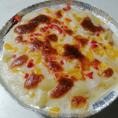 Shrimp Pasta Casserole With Cream And Mozzarella Cheese