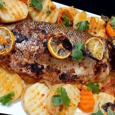 Grilled Gilthead Bream Meal with Oil and Lemon, served with clear broth soup