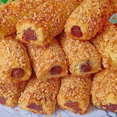 معمول تمر سادة مغطى بحبات السمسم