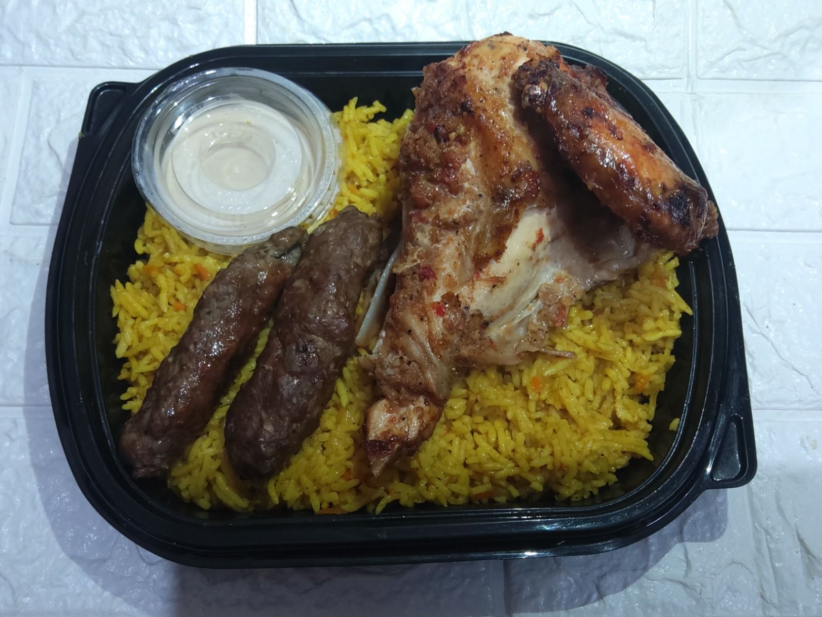 Basmati Rice And A Quarter Of Grilled Chicken And Tahini Meal