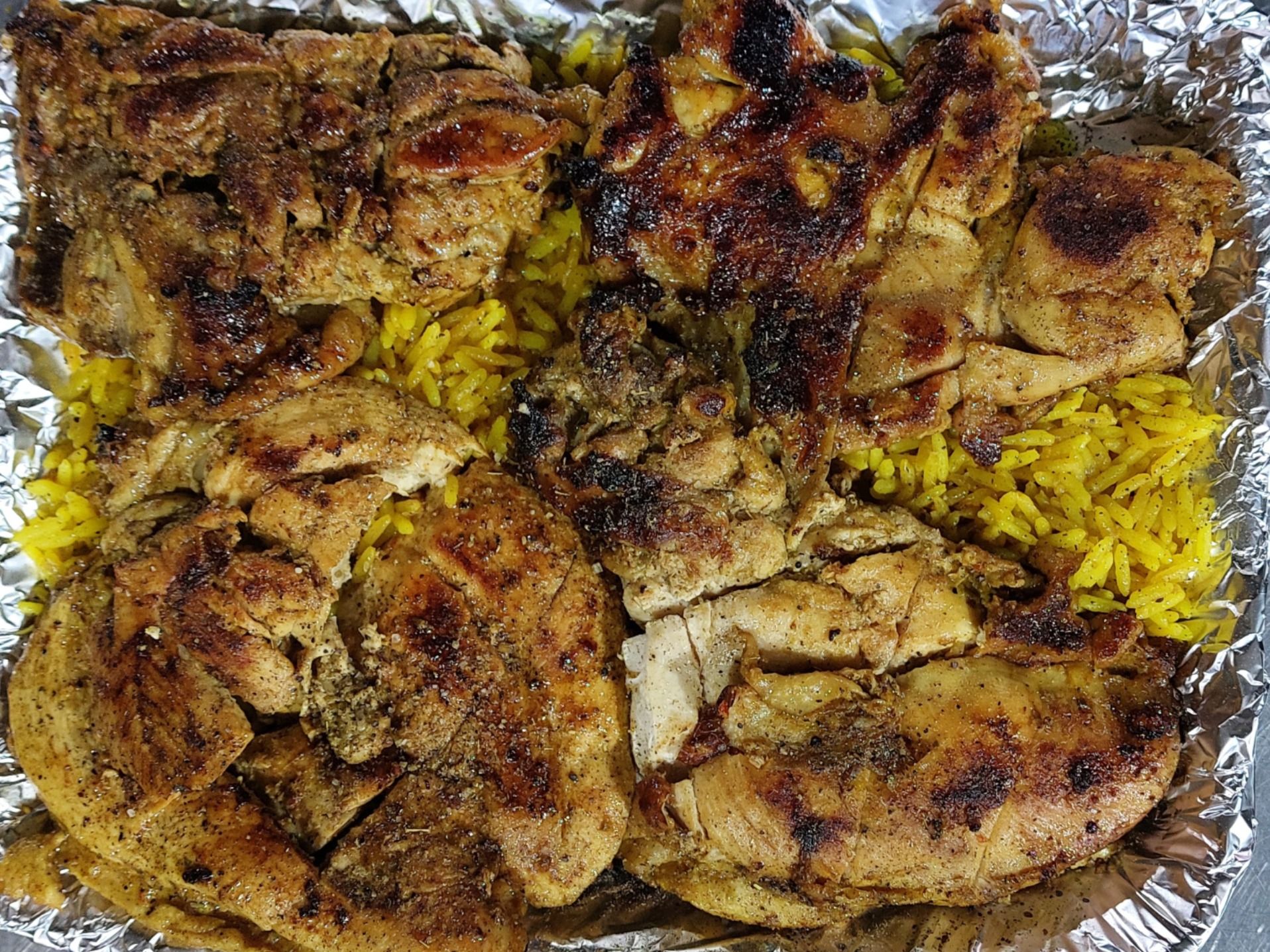 Boneless Baladi Chicken Grilled On The Grill With Basmati Rice