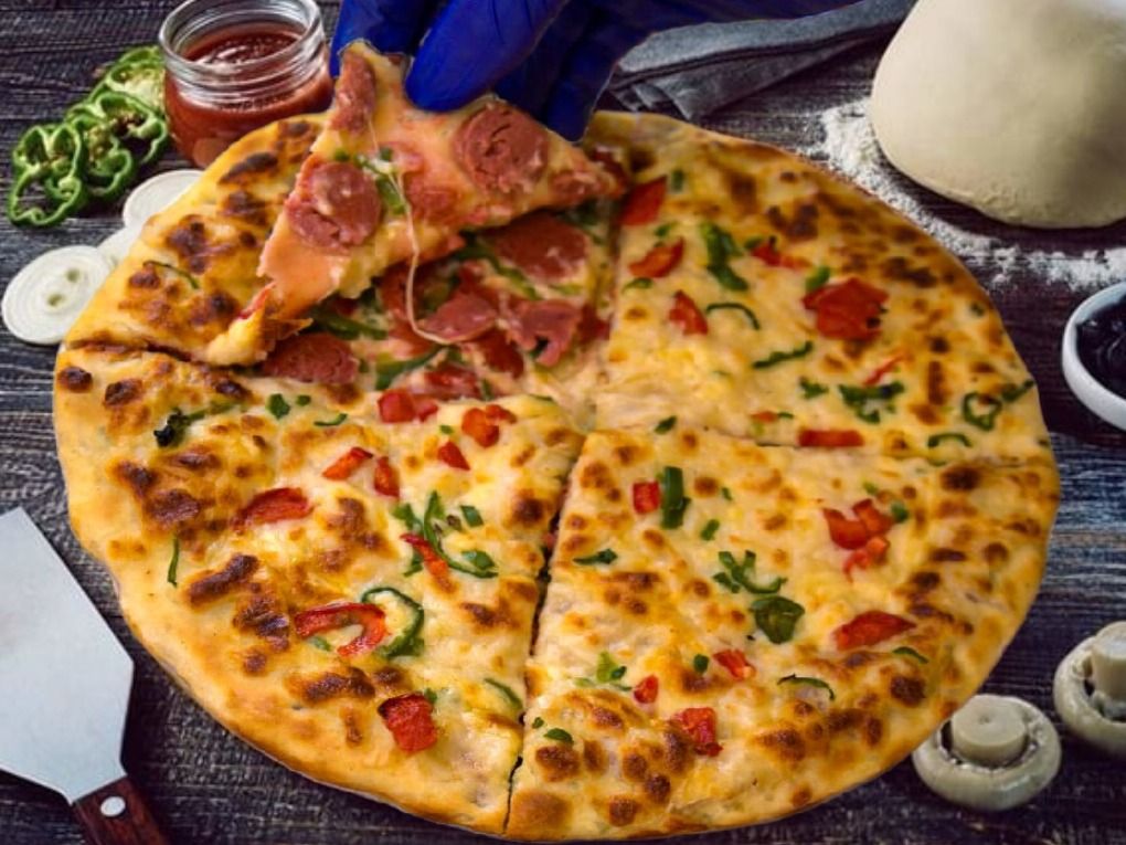 Susis Hawawshi Pizza Face