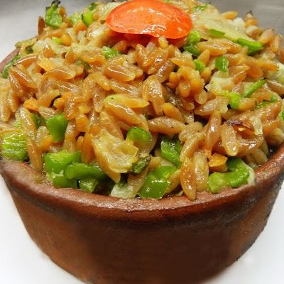 Orzo with meat cubes casserole