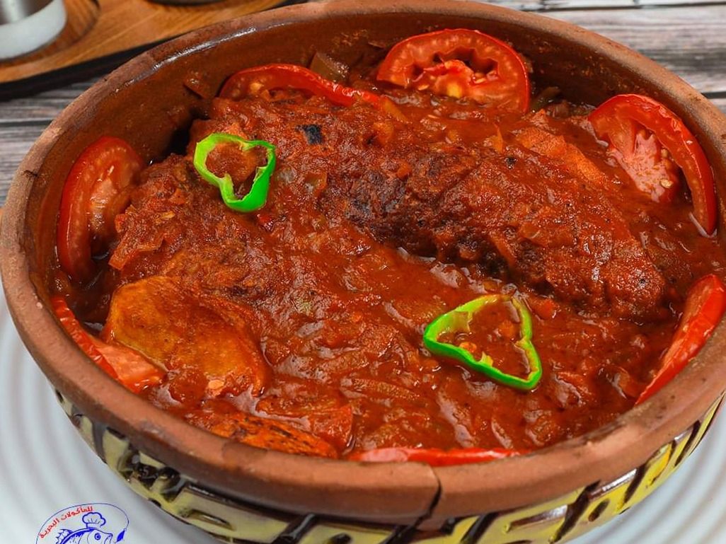 Grey Mullet Fish Casserole With Potatoes And Red Sauce
