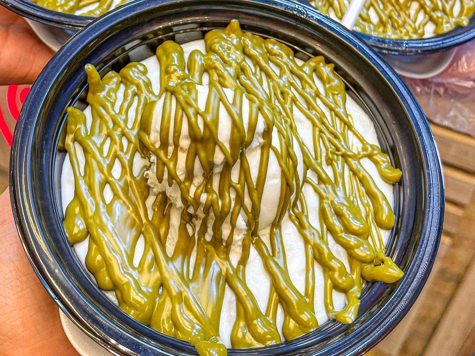 Rice Pudding With Pistachio Sause And scoop Pistachio Ice Cream