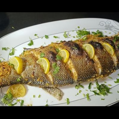 Grilled sea bass with oil and lemon