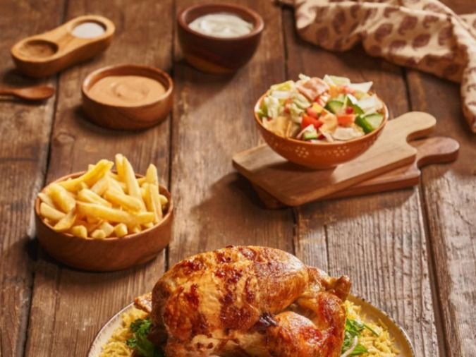 Chicken on Shawaya with rice and potatoes