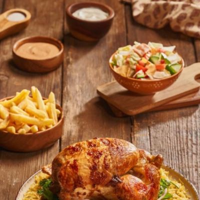 Chicken on Shawaya with rice and potatoes