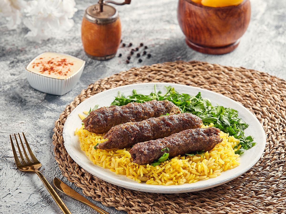 A Quarter Of His Kofta Is Grilled Over Charcoal