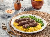 A Quarter Of His Kofta Is Grilled Over Charcoal