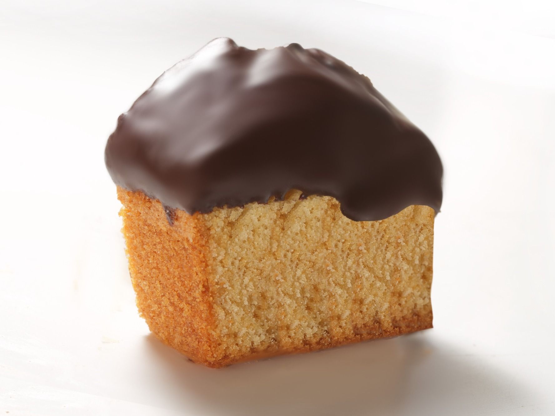 Slice Cake Covered With Chocolate Sauce