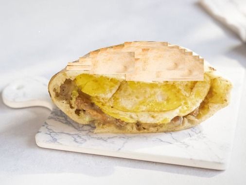 Foul With Fried Eggs Sandwich
