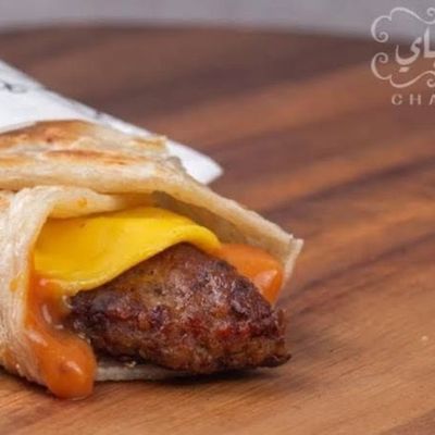 Paratha burger with cheddar sauce