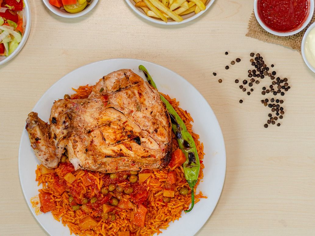 A Quarter Grilled Chicken With Kabsa Or Biryani Rice