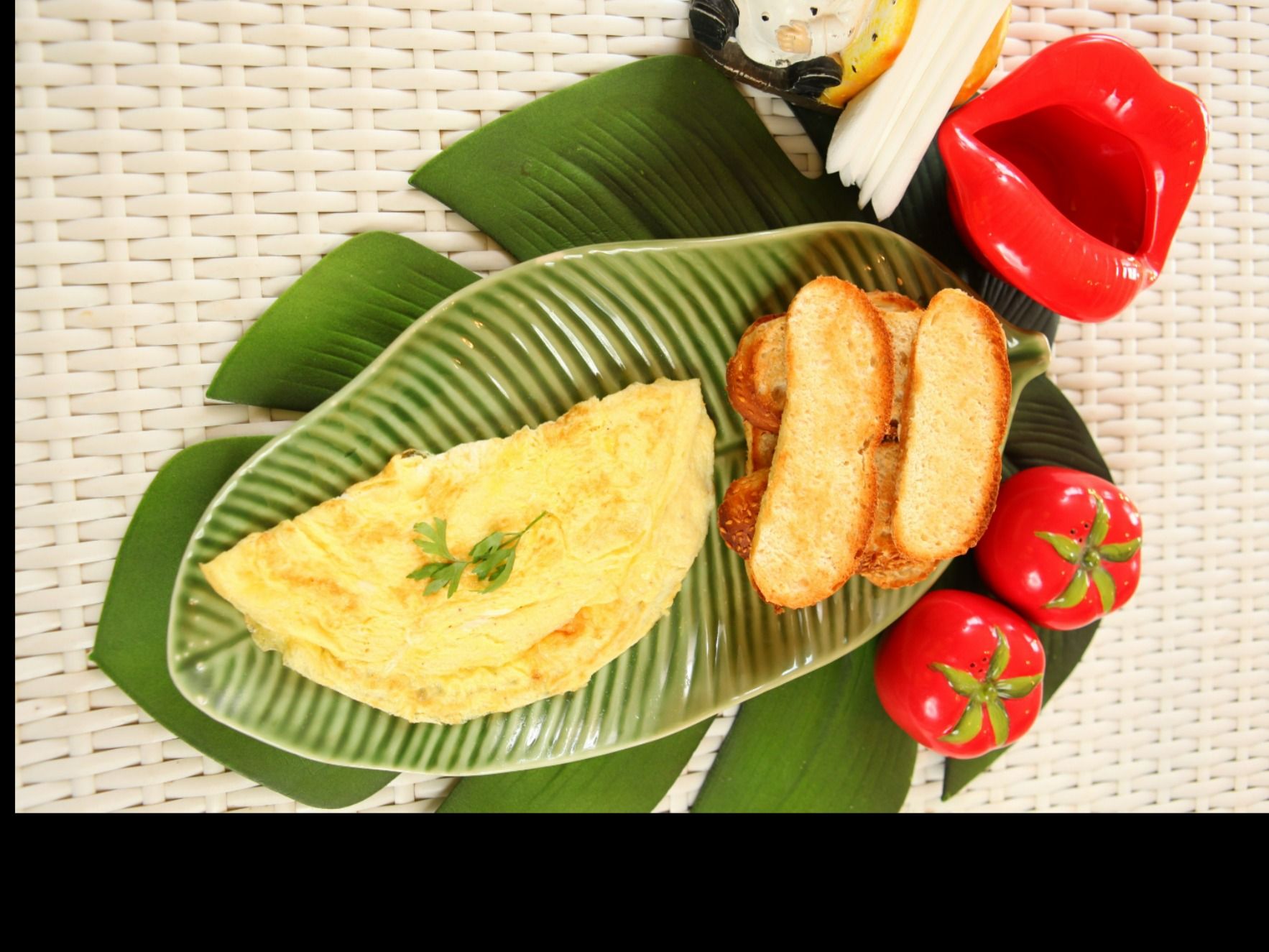 Plain Omelet Served With Bread Slices