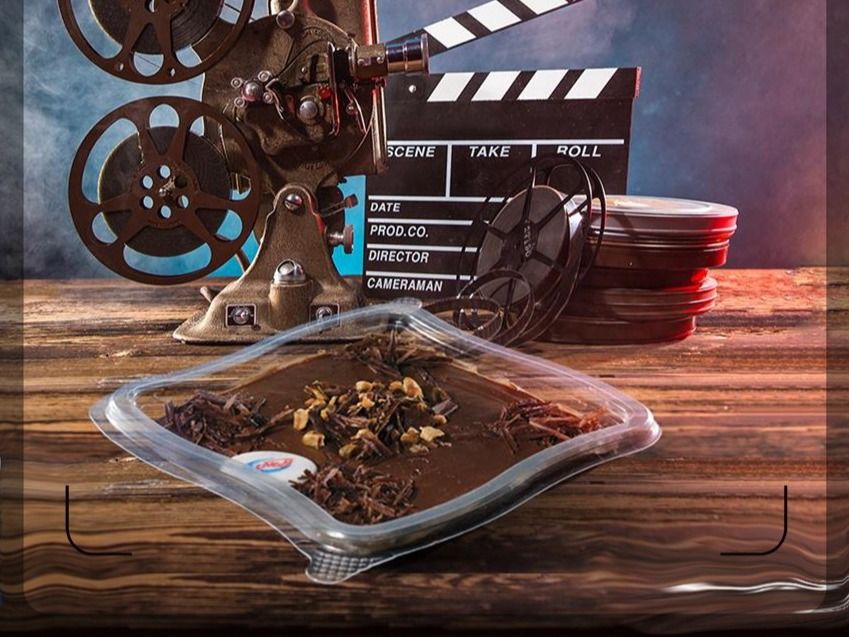 Chocolate Pudding With Lotus Biscuit And Caramel Sauce And Chocolate Sauce