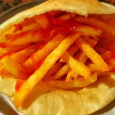 Potatoes with ketchup sandwich
