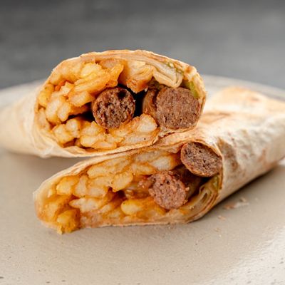 Grilled sausage with Syrian bread and potatoes