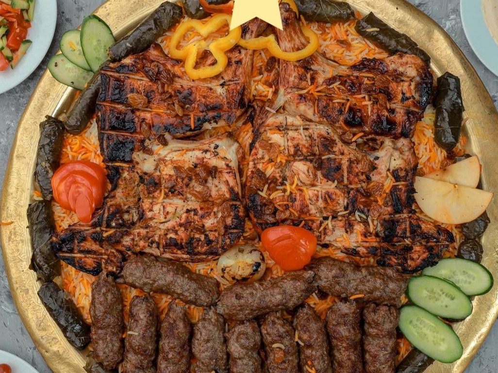 9 Pieces Of Chicken, 12 Pieces Of Kofta, Rice, Grape Leaves, Salad And Bread
