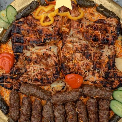 9 Pieces Of Chicken, 12 Pieces Of Kofta, Rice, Grape Leaves, Salad And Bread