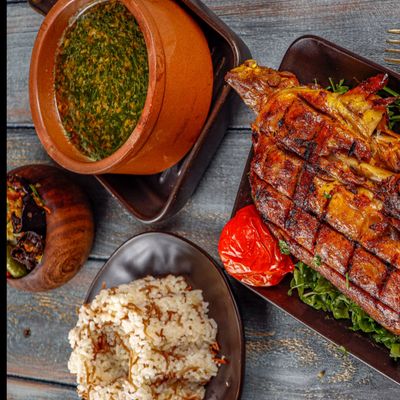 Half duck with rice and molokhia