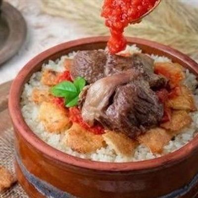 Fatteh dish with lamb