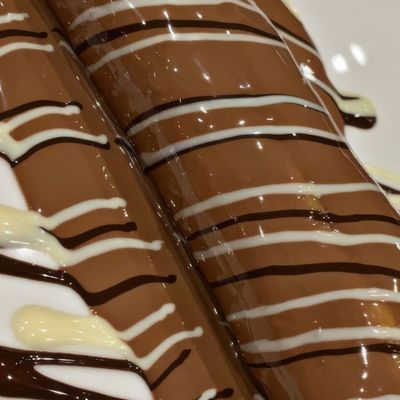 half Nutella and half white chocolate Crepe