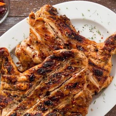 Whole chicken salema on charcoal