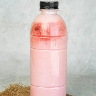 Bottle Of Soybean On Strawberry