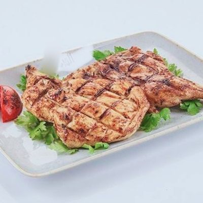 Half chicken tikka, salad, tahini and bread