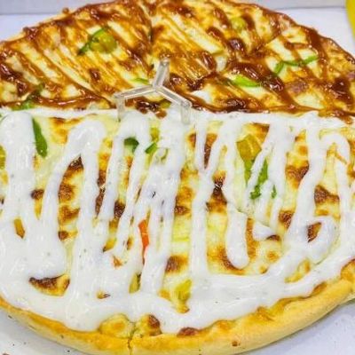Italian pizza, half ranch, half barbecue