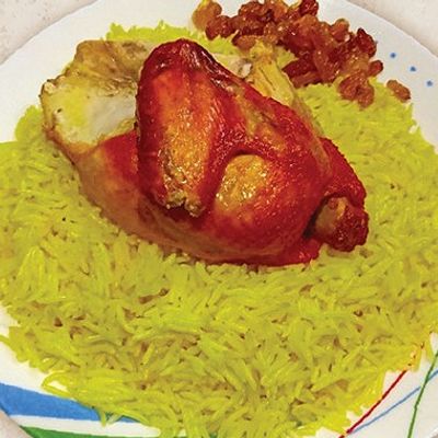 Quarter Mandi chicken breast with rice and sauce