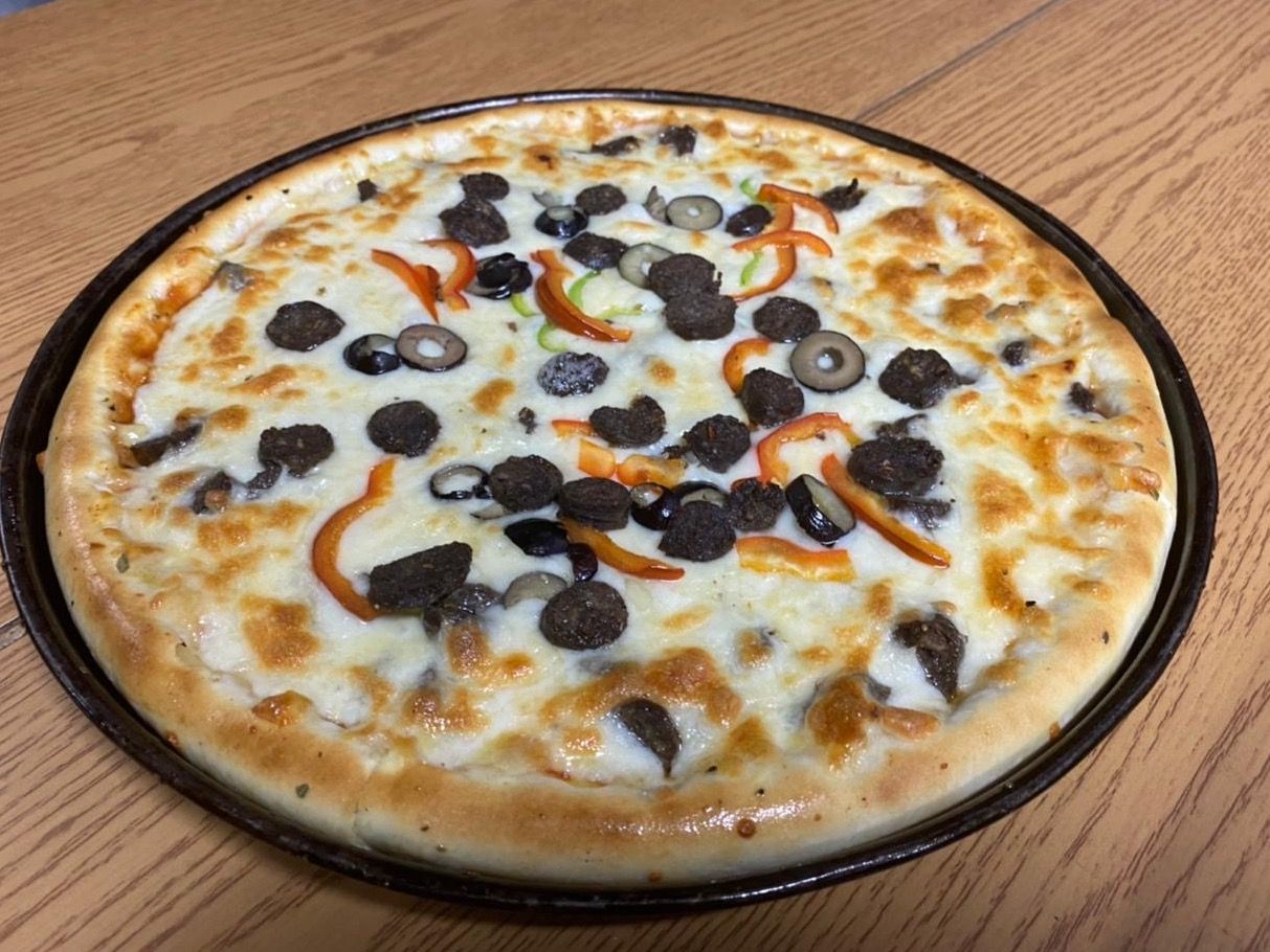 Mixed meats pizza