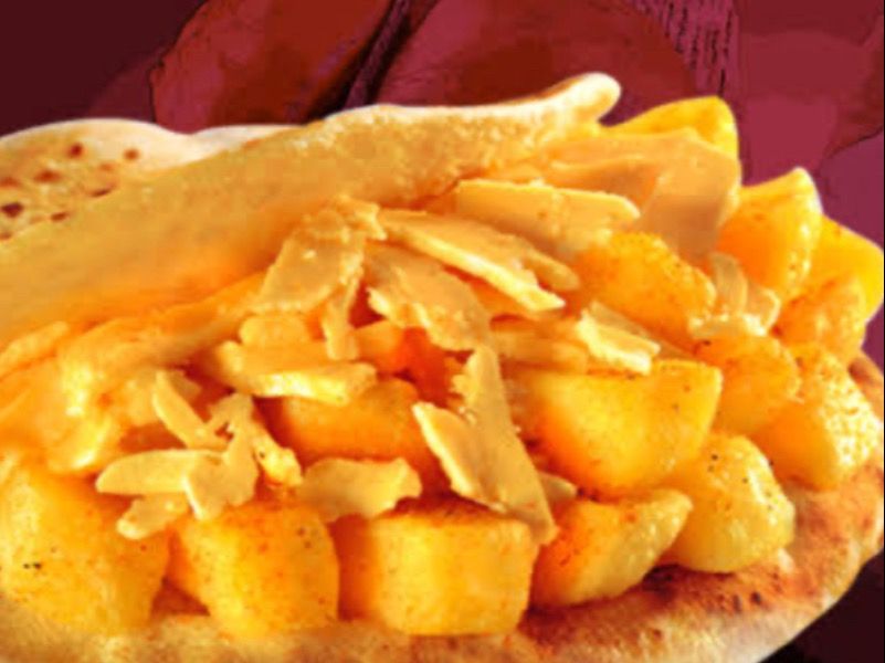Potatoes Sandwich With Cheese and Tomatoes